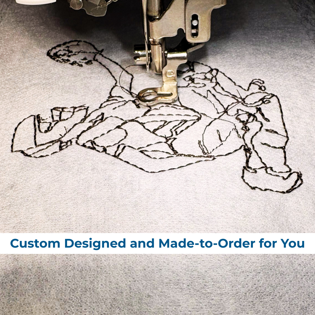 Embroidery machine stitching a design on fabric with text 'Custom Designed and Made-to-Order for You'.