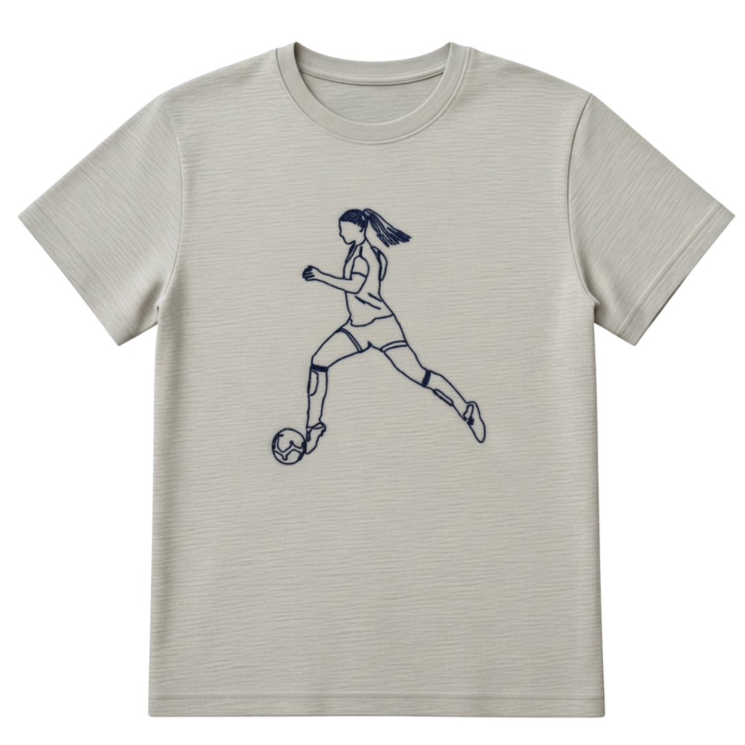 Grey t-shirt with a custom embroidery design of a soccer player.