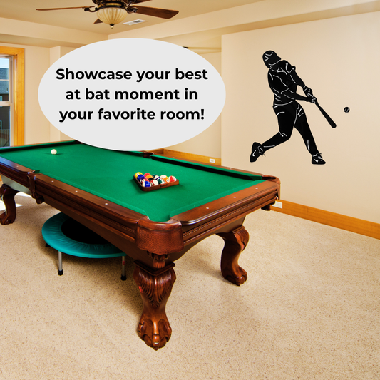 Custom silhouette wall decal of a baseball player batting is shown on a beige wall in a room with a green pool table. A speech bubble reads, 'Showcase your best at bat moment in your favorite room!'
